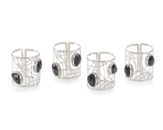 Picture of SET OF FOUR BLACK ONYX AND NICKEL NAPKIN RINGS